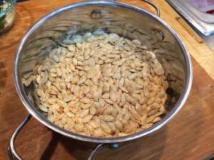 Pumpkin seeds tossed with oil and seasoning.