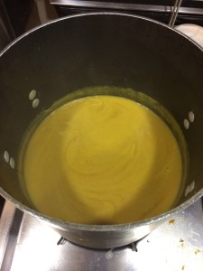 The cooked soup in the pot.