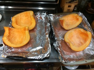 Pumpkin quarters before the oven.